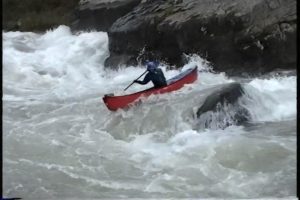 Milt Aitken canoeing Pillow Rapid, Gauley River