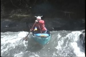 Open Canoe runs Bull Sluice at high water