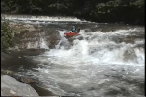 Milt Aitken canoeing Rudolph Falls, Cherry River, WV