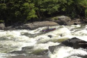 Milt Aitken canoes Iron Ring, Upper Gauley River, WV